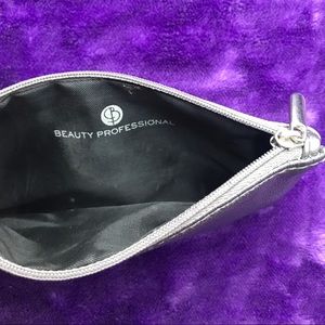 Metallic silver mini zip pouch